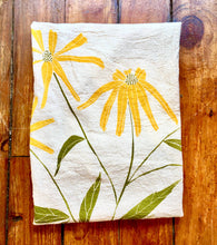 Load image into Gallery viewer, Tea towel with black eyed susans flower screen printed onto unbleached cotton