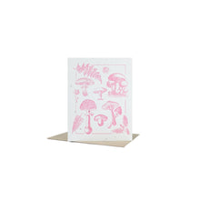 Cargar imagen en el visor de la galería, Greeting card with pink images of mushrooms and leaves like you&#39;d see in the forest. Printed on white plantable seed card that contains seeds of 10 kinds of wildflowers. 
